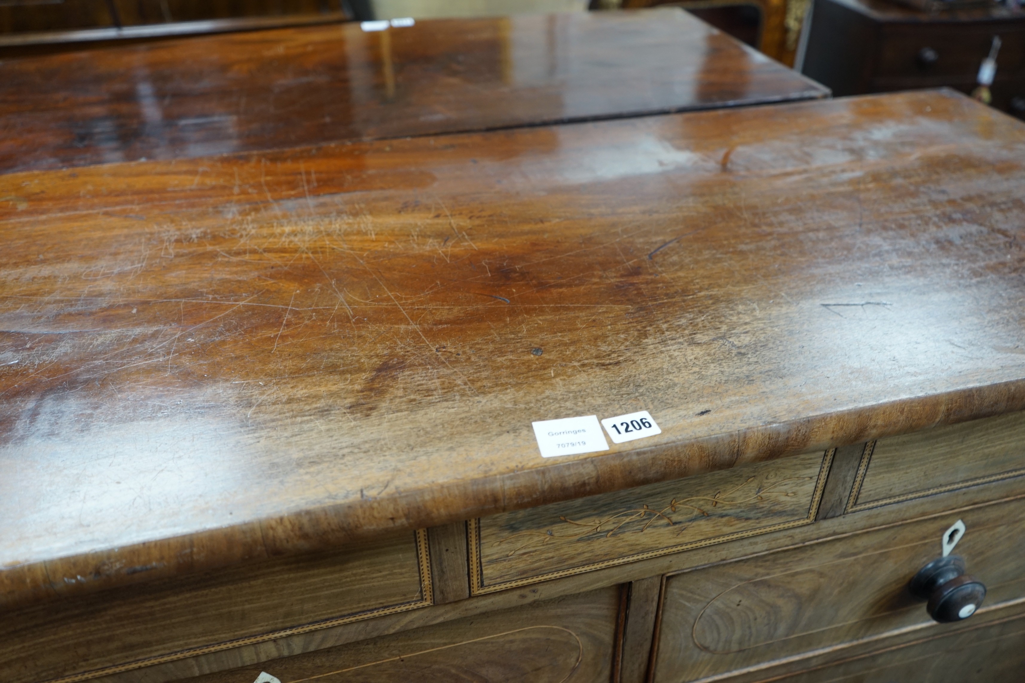 A George IV inlaid mahogany chest of eight drawers, width 122cm, depth 53cm, height 120cm